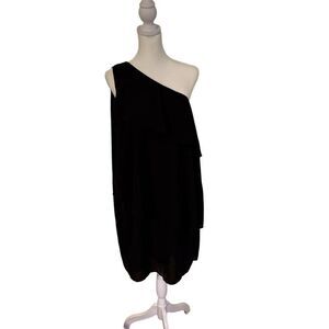 Large one shoulder black ruffle dress